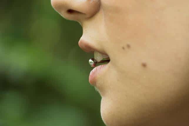 the dangers of oral piercings 63a31d8e88fee
