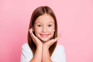 A happy child at the dentist in Corona